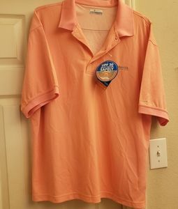 Columbia Omni Shade salmon colored polo shirt